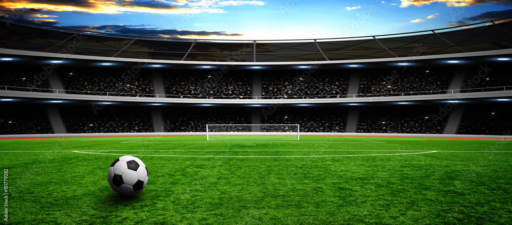 Soccer ball on green stadium