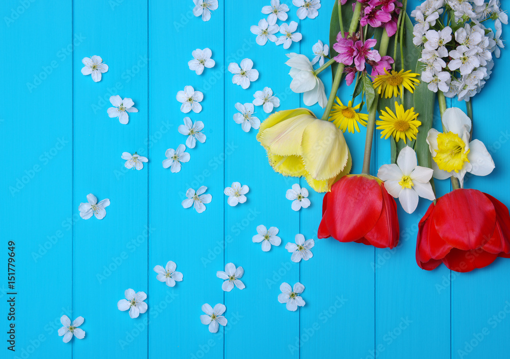 Tulips on a wooden background