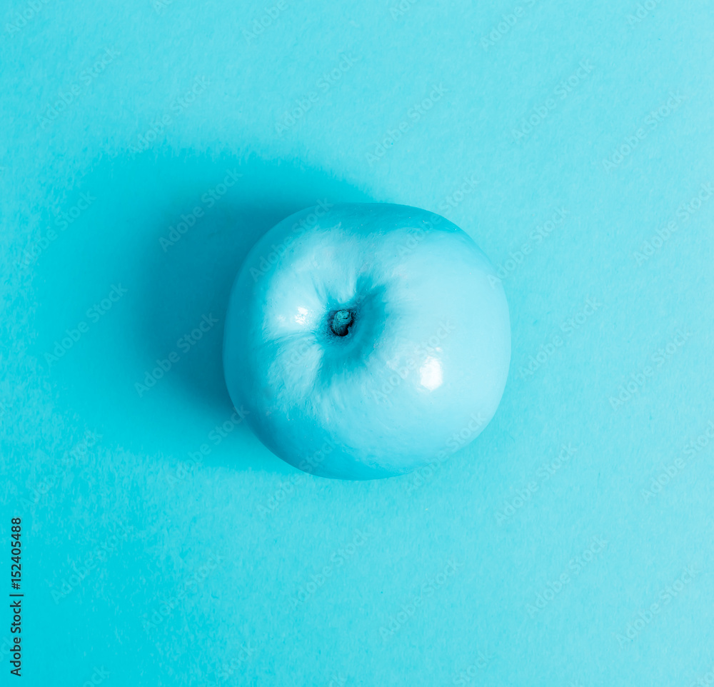 Painted fruit on a blue background