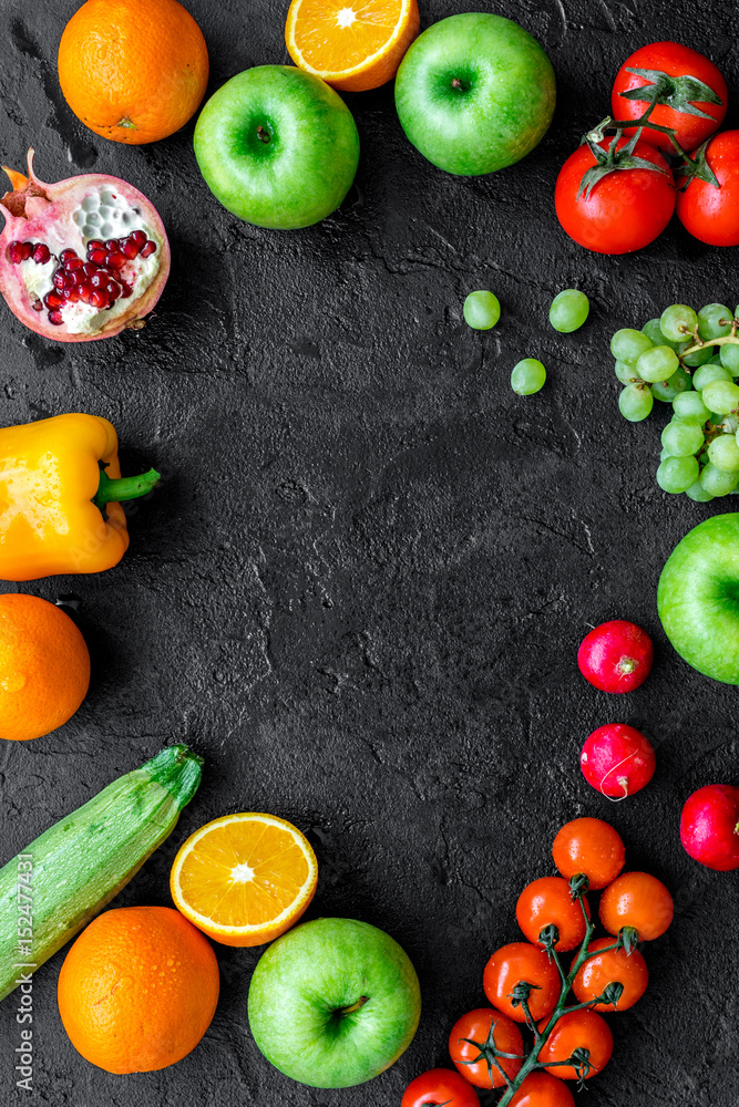 diet food with fresh fruits and vegetables salad dark background top view mockup