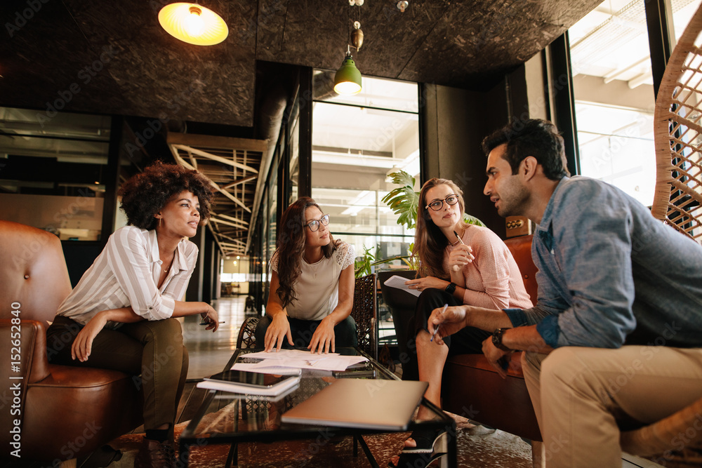 Creative people having a meeting in office