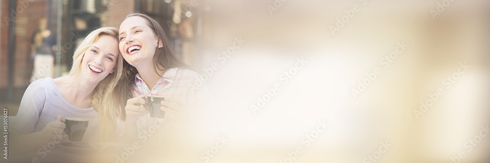 Cheerful women laughing together