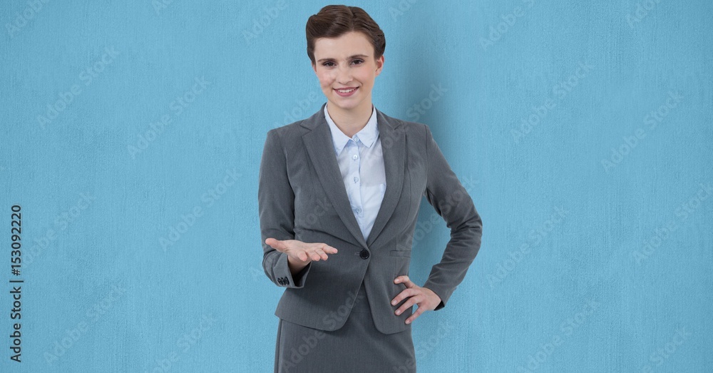 Businesswoman gesturing over blue background