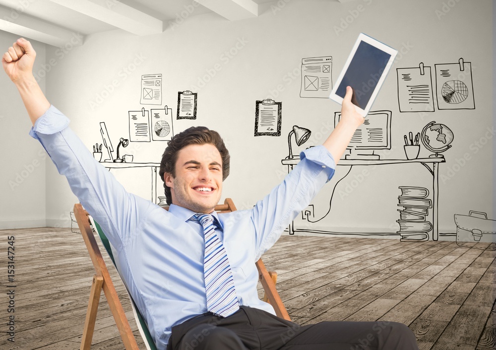 Happy businessman holding tablet PC 