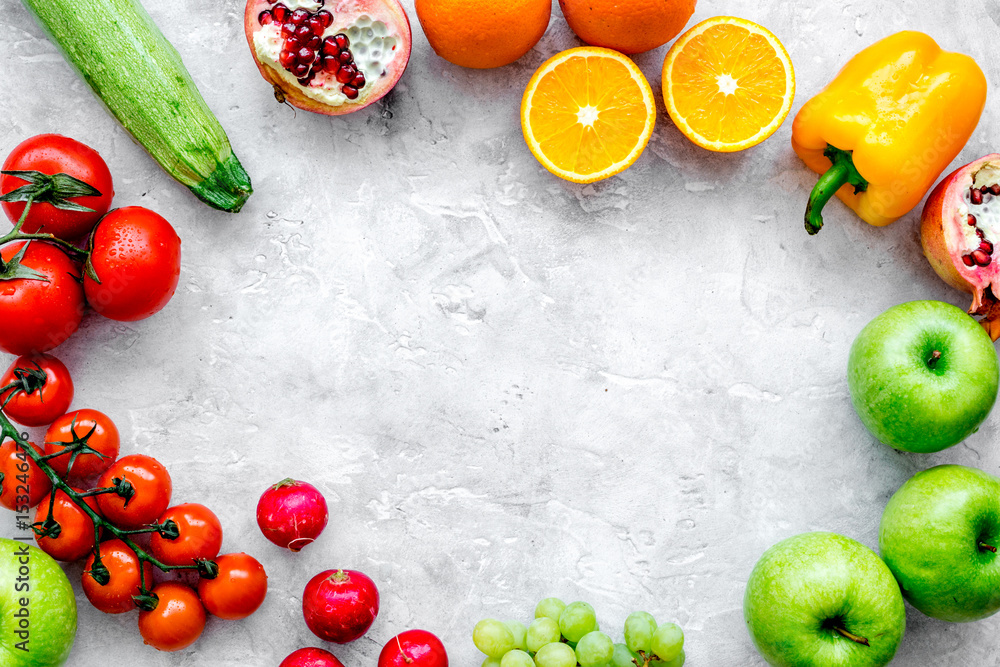 fresh vegetables and fruits for fitness dinner on stone background top view mockup