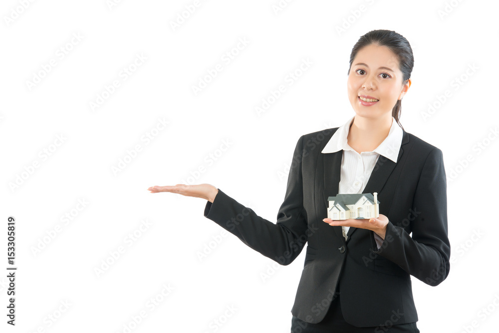 enthusiastic young girl holding house