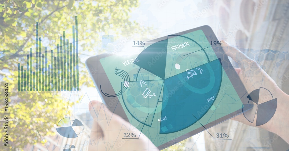 Hands holding digital tablet with pie chart overlay