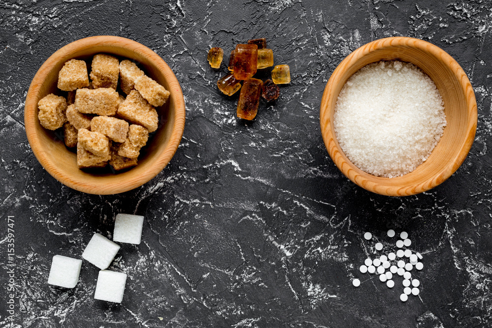 lumps and sanding sugar for sweets on kitchen table background top view