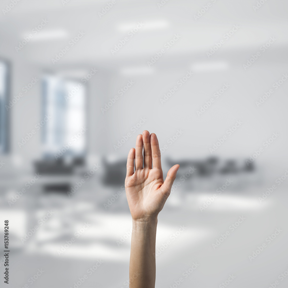 Choosing gesture of person in elegant modern interior in sunshin