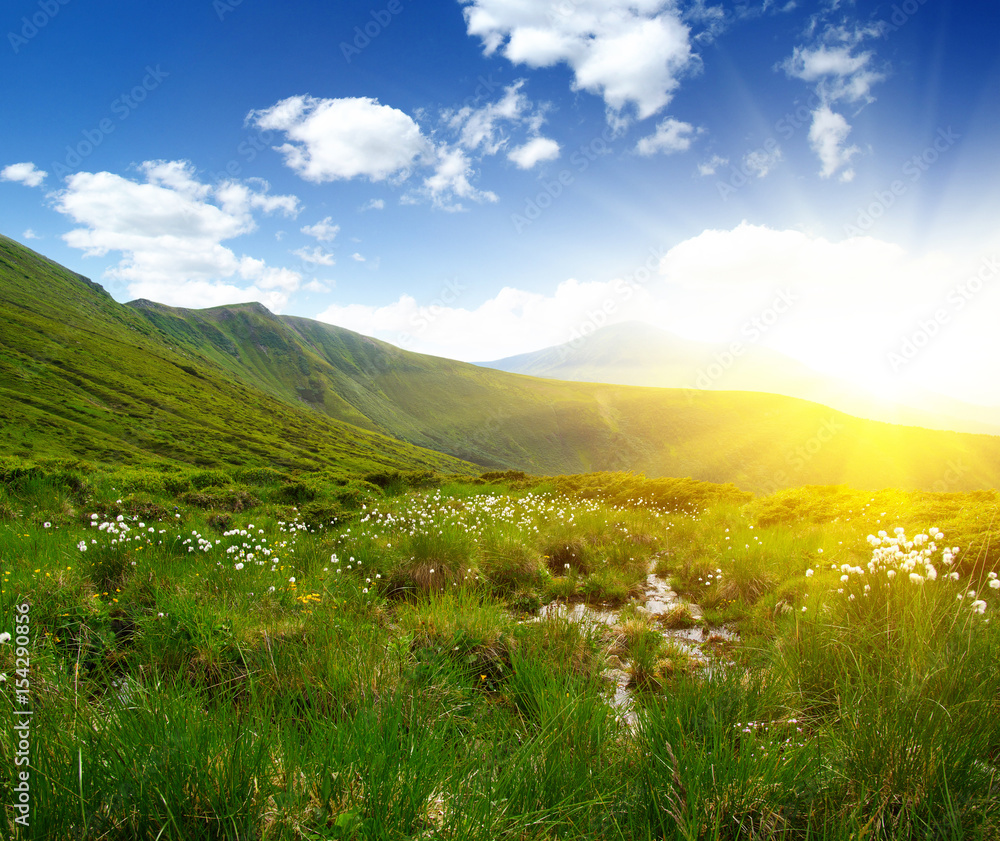 Mountain landscape on sun