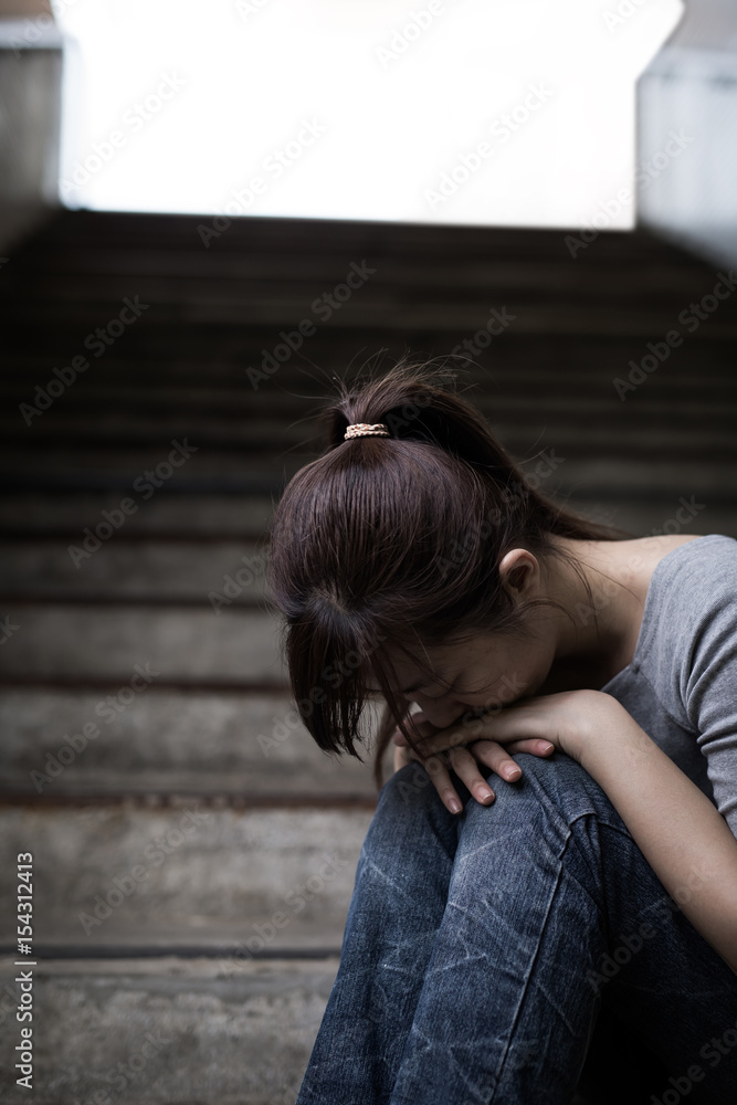 depressed woman in underground