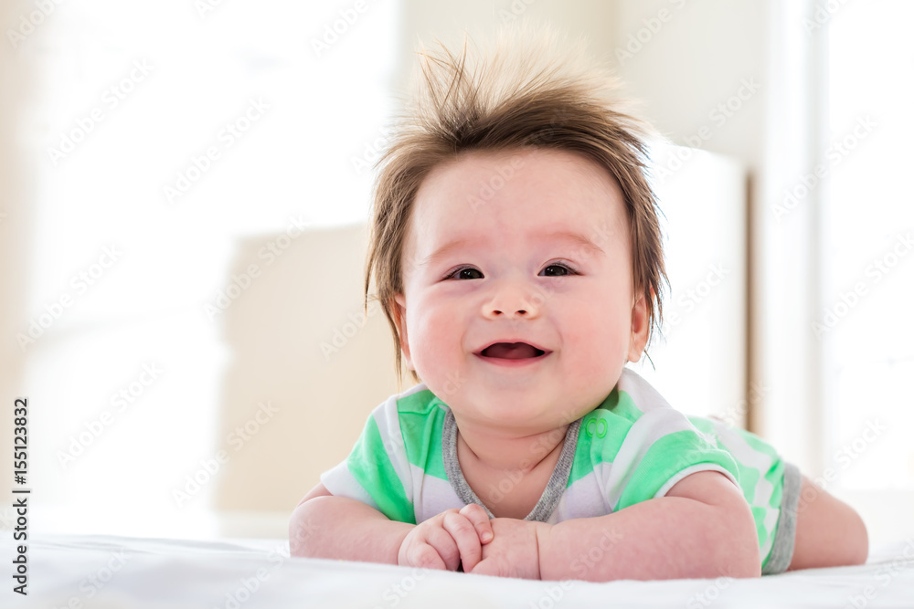 Happy baby boy smiling