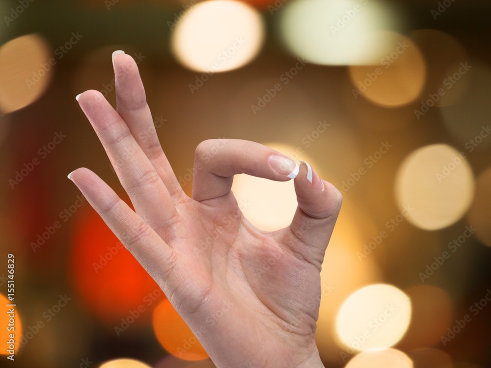 Human hand on background.