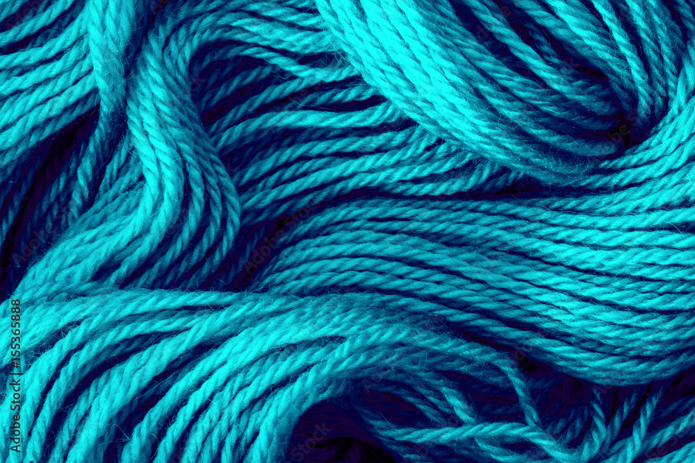 Close up the blue yarn thread as abstract  background