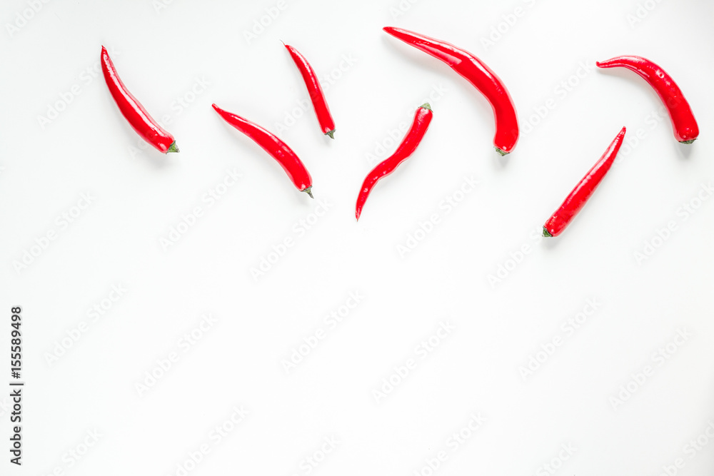 red food with chili pepper on white background top view space for text