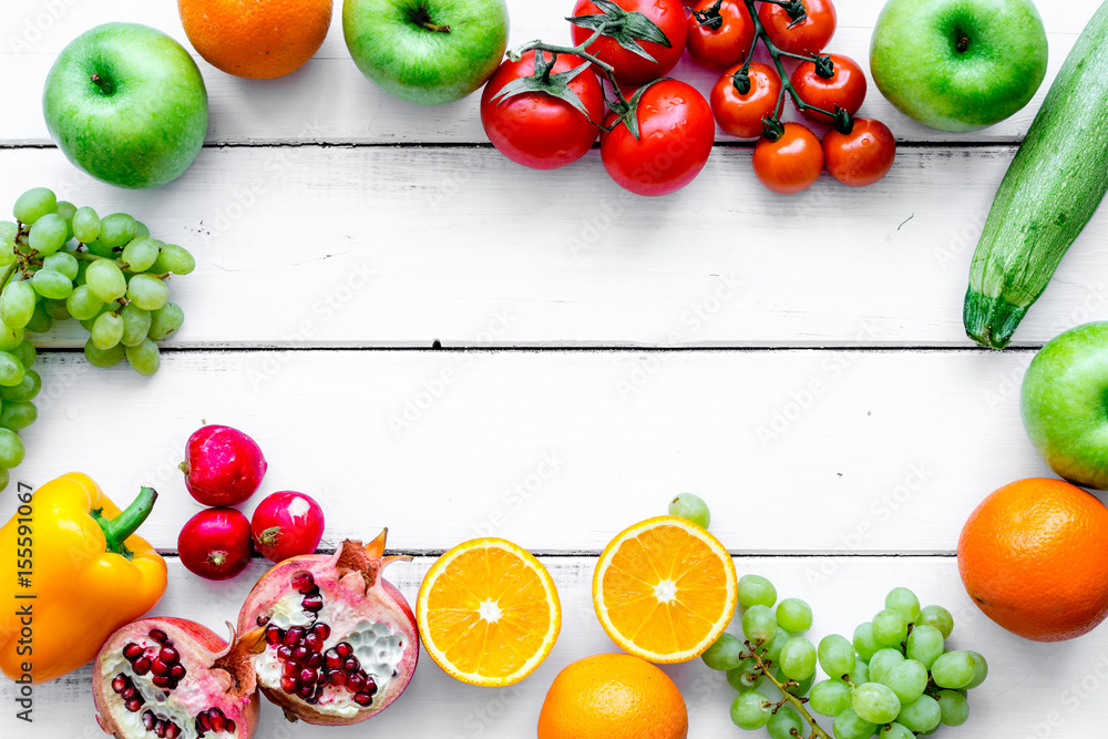 fresh vegetables and fruits for fitness dinner on white background top view mockup