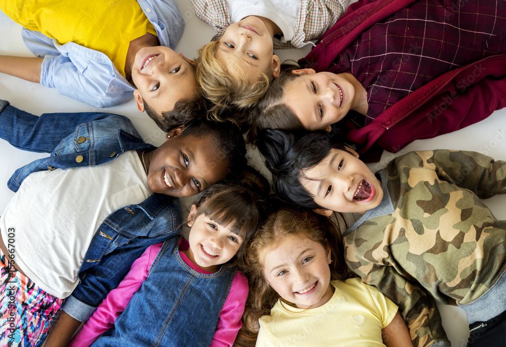 Happiness group of cute and adorable children lay down together