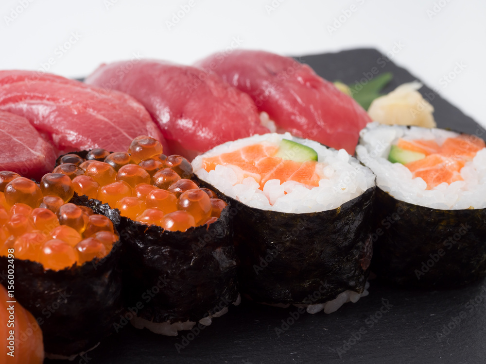 sushi set on black plate