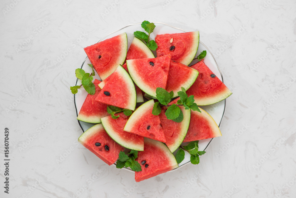 Fresh sliced watermelon on a plate in summertime