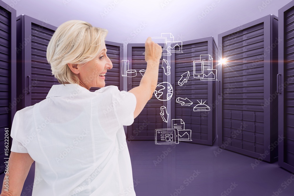 A businesswoman is drawing schema against server room background