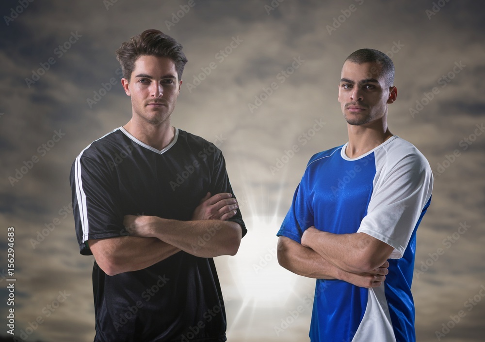 soccer players with sky background