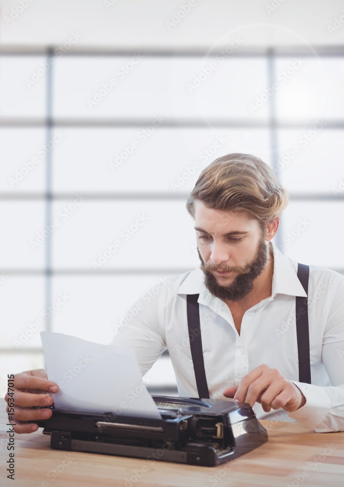 Hipster man  on typewriter with windows