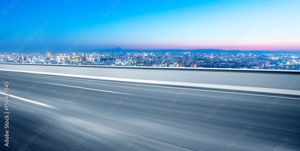 empty road with cityscape of modern city