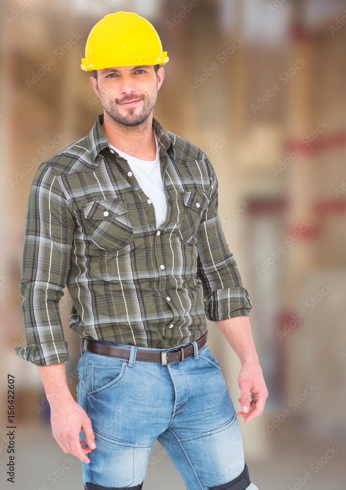 Construction Worker in front of construction site