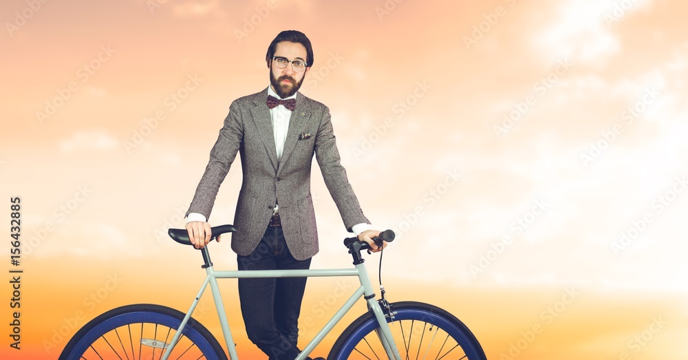 Reflecting hipster man with a bike 