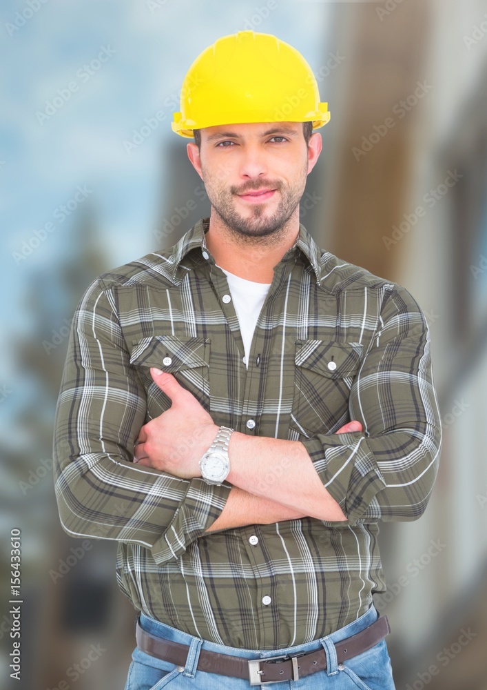 Construction Worker in front of construction site