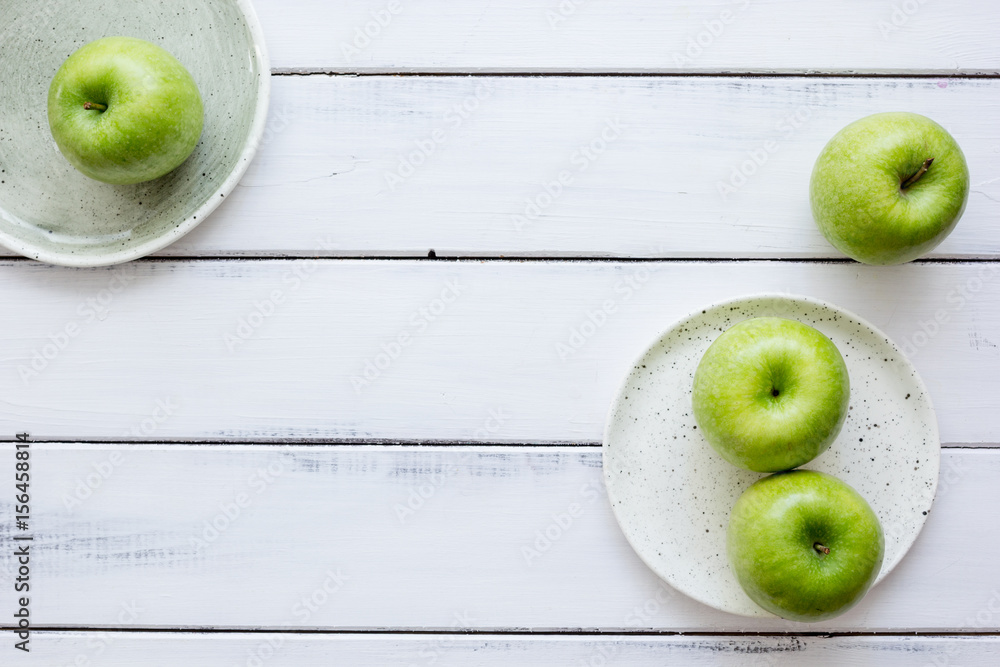 ripe green apples white table background top view space for text