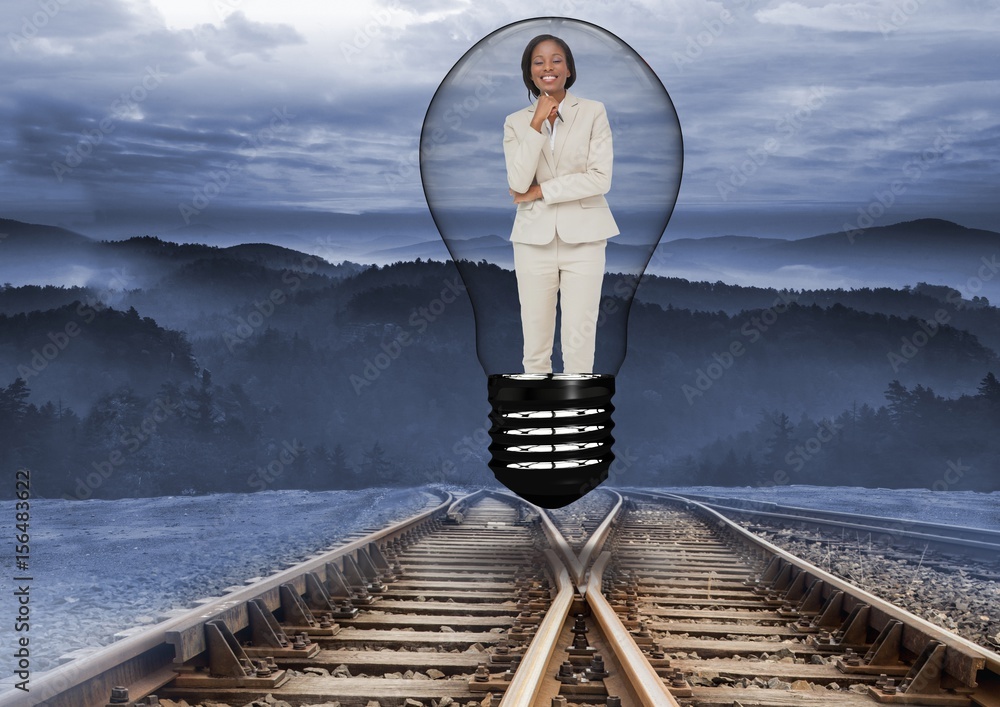 Digital image of businesswoman in bulb over 