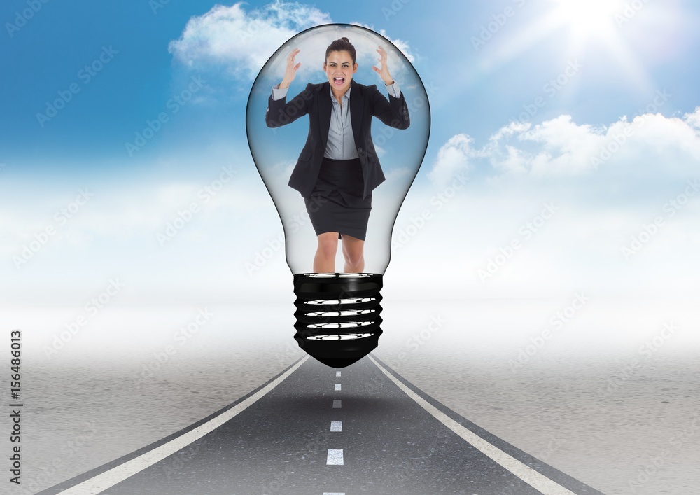 Angry businesswoman in light bulb over road