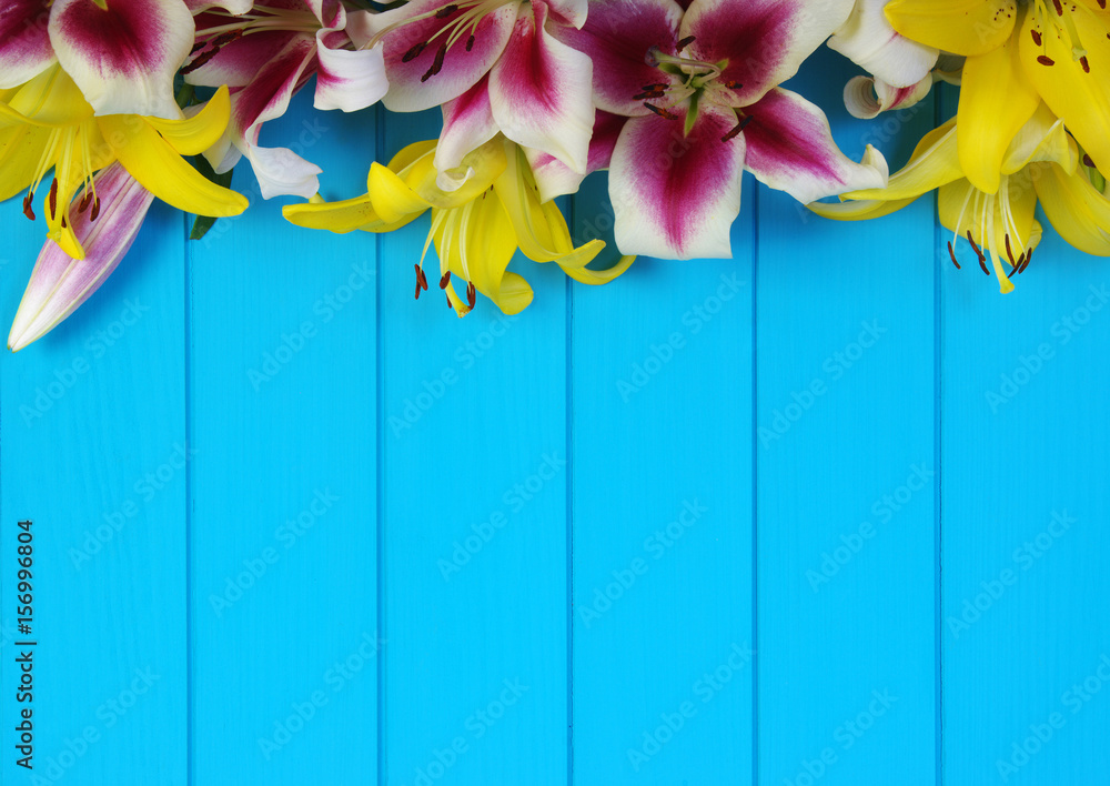  lily flowers on wooden planks