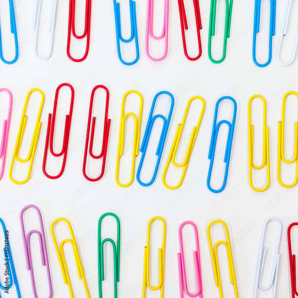 Metal paper clip isolated on a white background