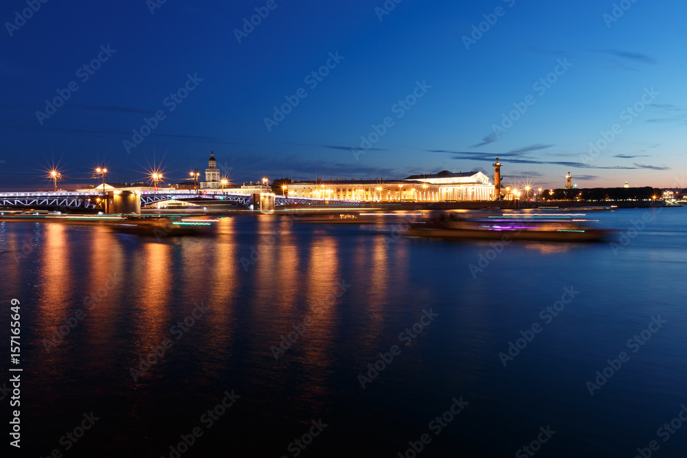 St. Petersburg By Night. Panorama of night city. View on the Neva river and the open bridge.