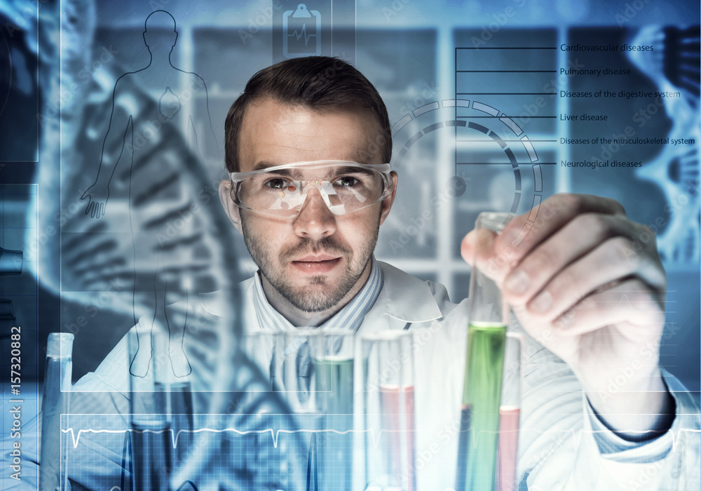 Young scientist mixing reagents in glass flask in clinical laboratory