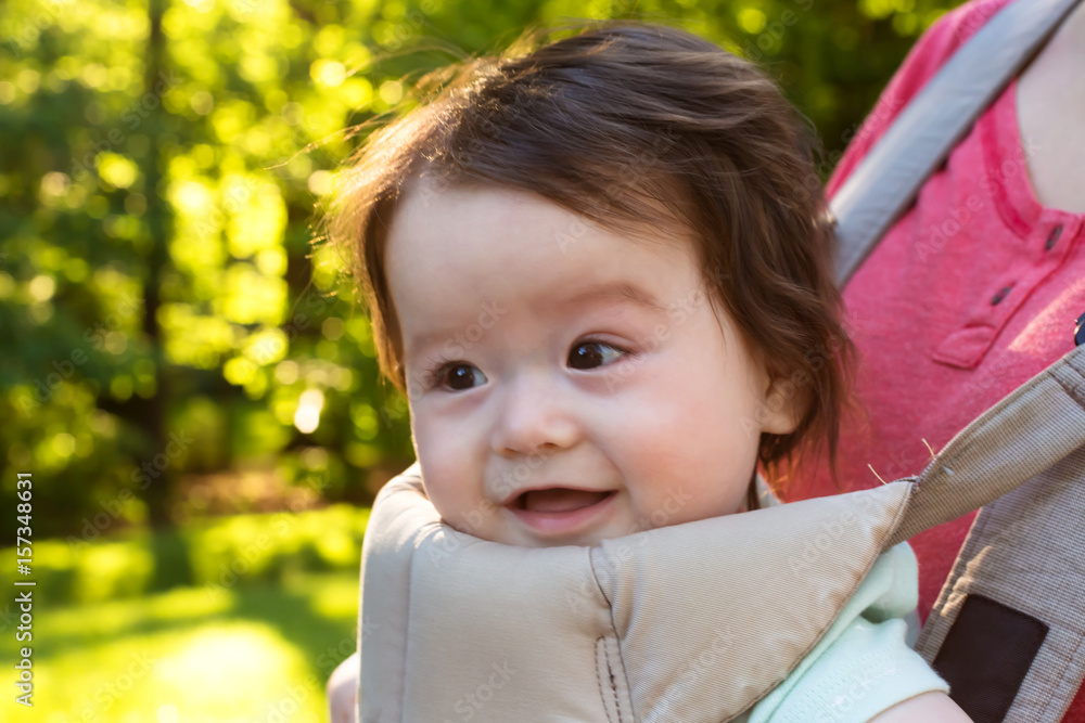 Happy baby boy outside