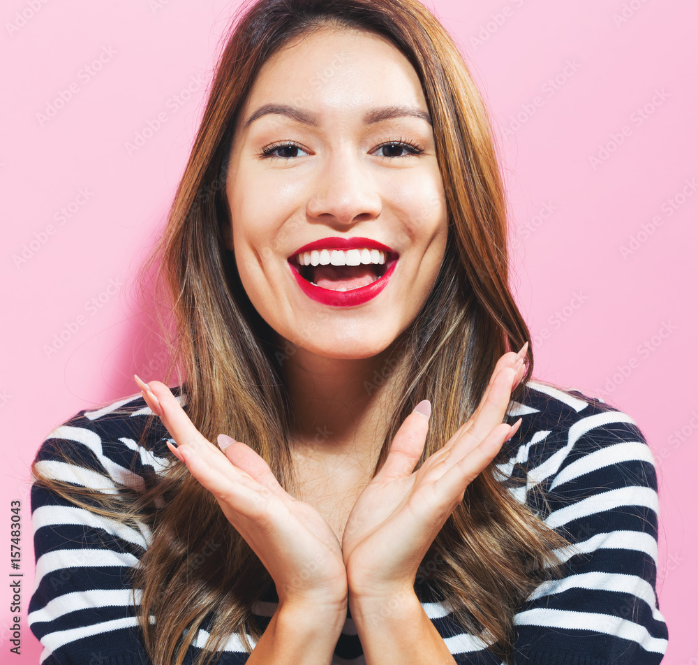 Surprised young woman posing