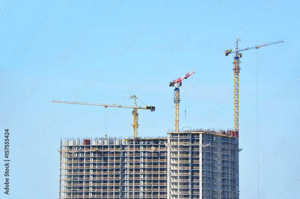 Crane and highrise construction site