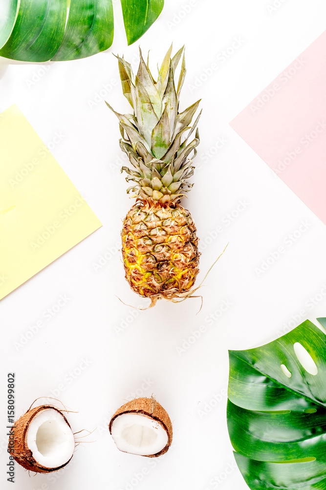 sliced exotic fruits on white background top view space for text