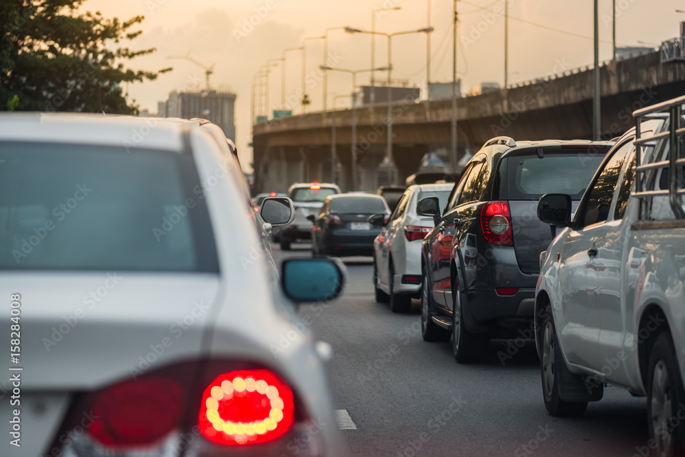 traffic jam with row of cars on high way to the city