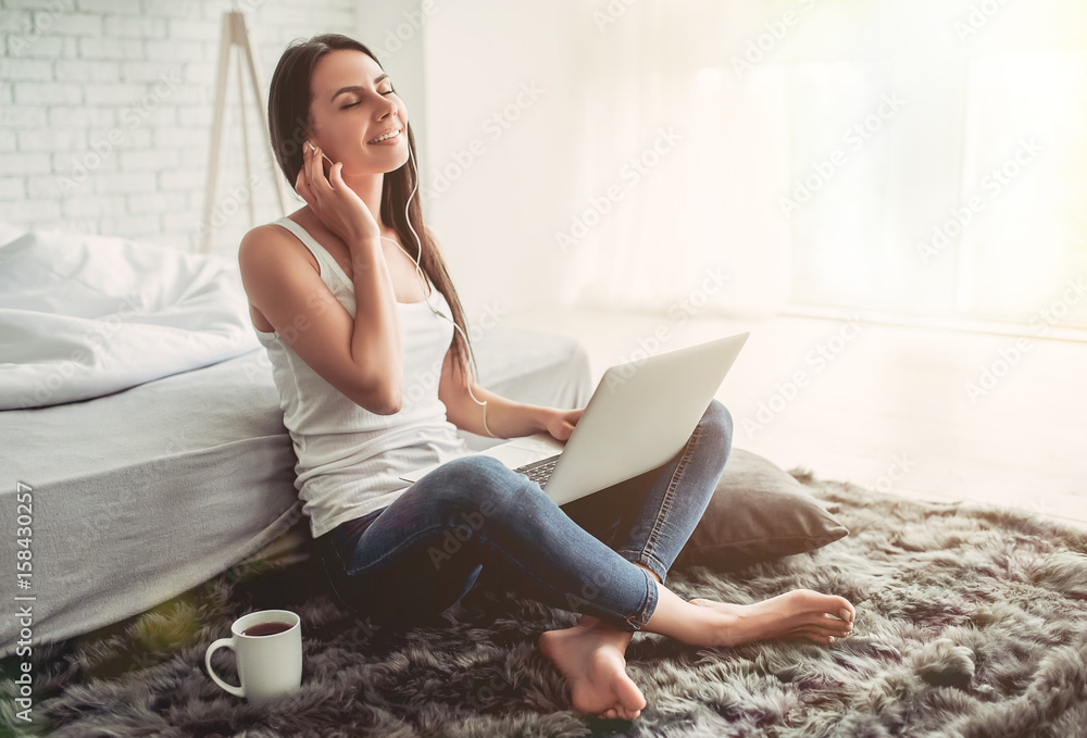 Charming young woman at home