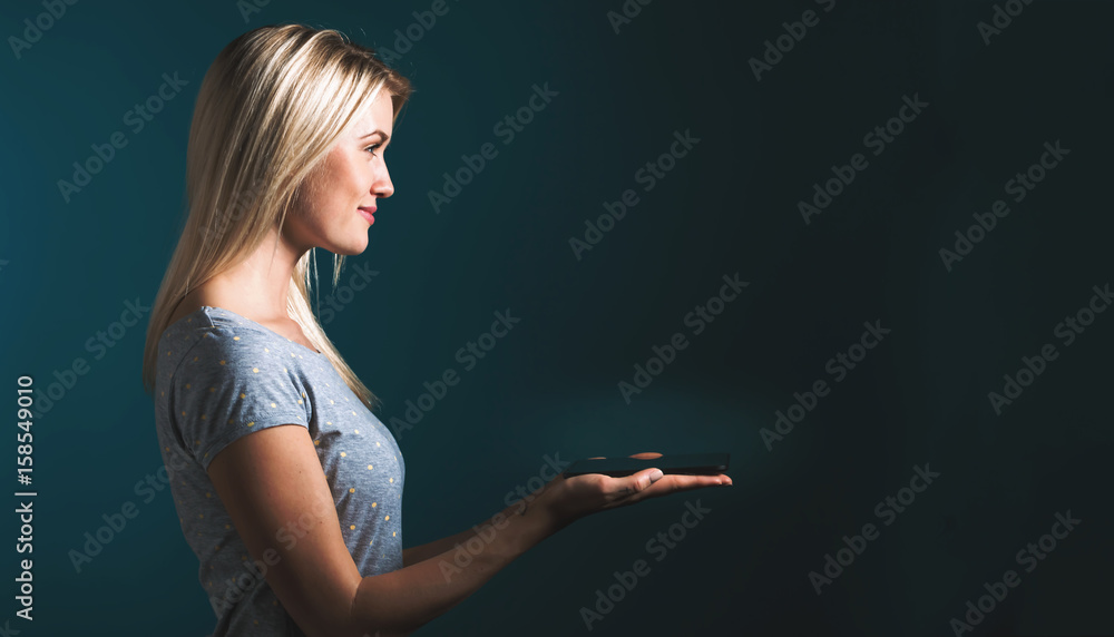 Young woman using her tablet