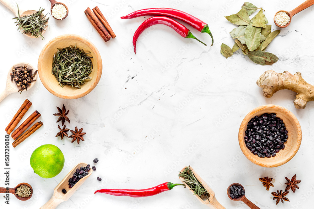 Dry colorful spices, chili pepper on kitchen stone table background top view mockup