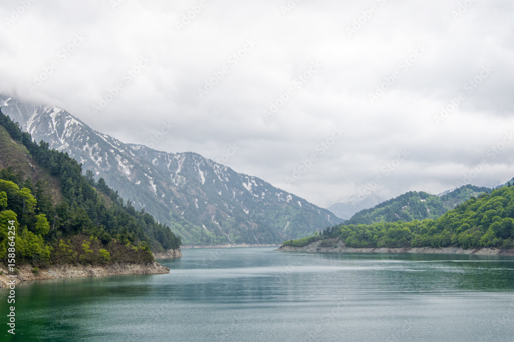 The view of Kurobe Dam. The Kurobe Dam or Kuroyon Dam is a variable-radius arch dam on the Kurobe Ri