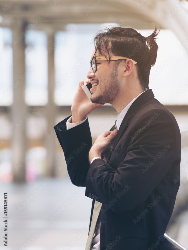 Business Man Speaking on the Phone