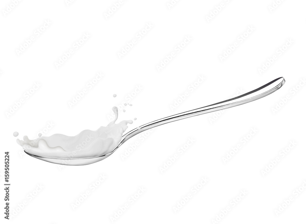 Splashes of yogurt on a spoon, on white background