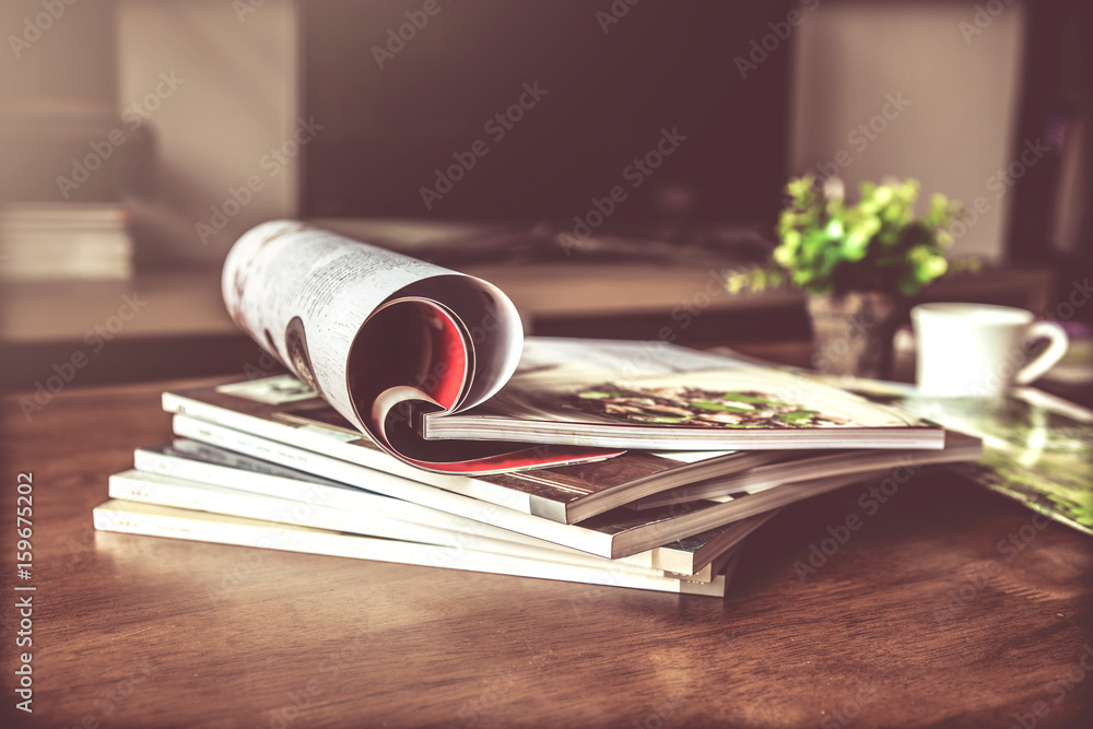 selective focus of  stacking magazine place on table in living room