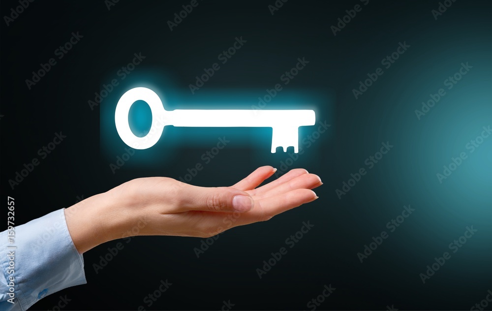 Hand and key.